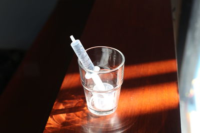 Close-up of water in glass on table