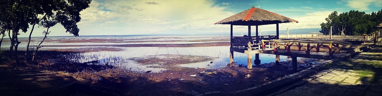 water, sea, beach, tranquility, tranquil scene, scenics, sky, horizon over water, shore, beauty in nature, nature, idyllic, tree, sand, vacations, absence, parasol, beach umbrella, chair, sunlight