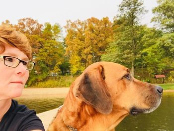 Close-up of boy with dog