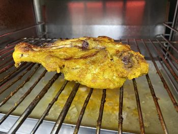 Close-up of meat on barbecue grill