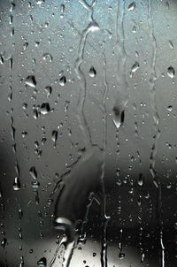 Rain drops on water