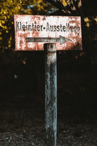 Close-up of rusty sign