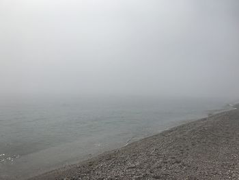 Scenic view of sea against sky during winter