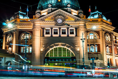 Light trails on city street at night