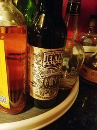 Close-up of beer bottles on table