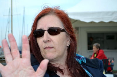 Close-up of young woman in sunglasses