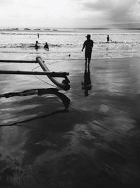 People playing at beach