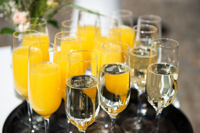 Close-up of wine glasses on table