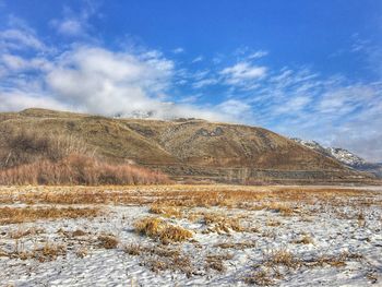 Scenic view of mountains against sky during winter