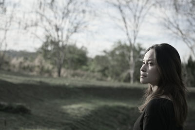 Side view point of young woman in lonely emotion