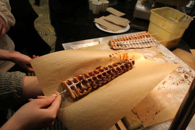 High angle view of man preparing food