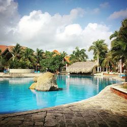 Scenic view of sea against cloudy sky