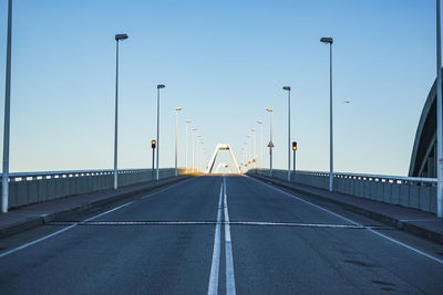 Empty road against clear sky