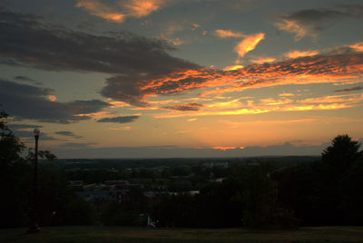 Scenic view of landscape against cloudy sky