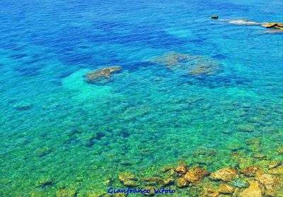 High angle view of blue sea