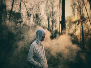 Man standing in forest