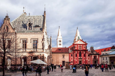 Tourists at st georges basilica at prague castle in czech republic