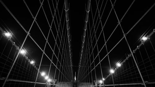 Low angle view of illuminated lights at night