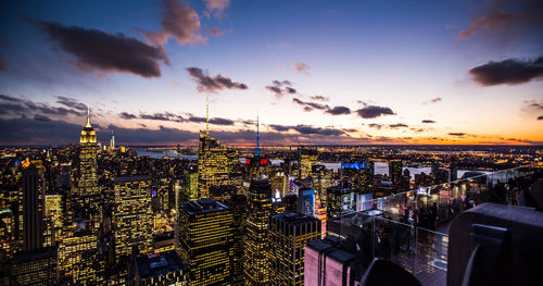 High angle view of illuminated modern buildings at manhattan