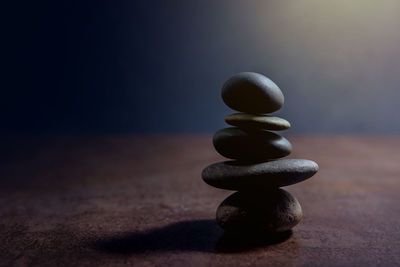 Stack of pebbles at night