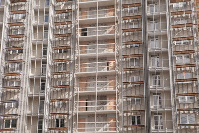 Close-up, construction of a skyscraper from metal-concrete elements
