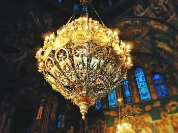 Low angle view of illuminated lights at night