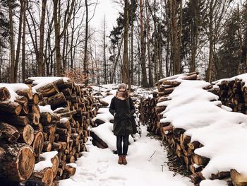 Woman in winter forest