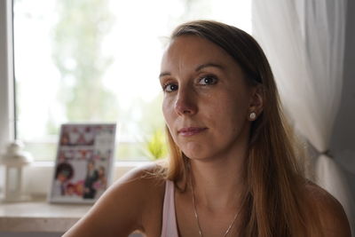 Portrait of beautiful woman at home