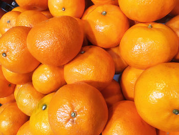 Full frame shot of oranges in market