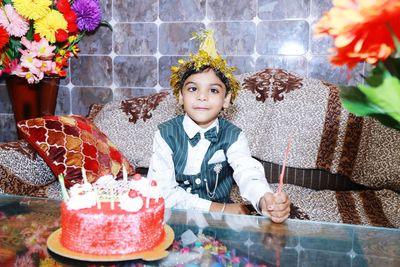Portrait of cute baby girl at home