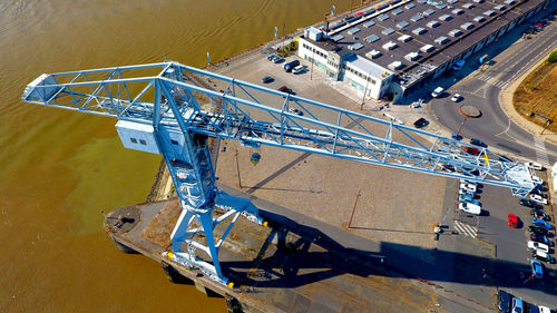 High angle view of crane by river