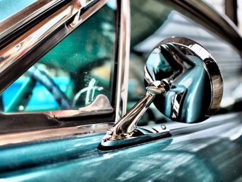 Close-up of vintage car on side-view mirror