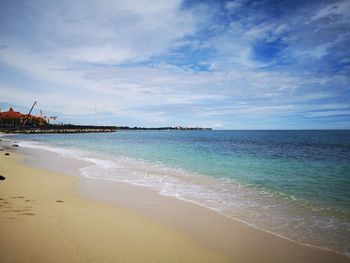 Scenic view of beach against sky