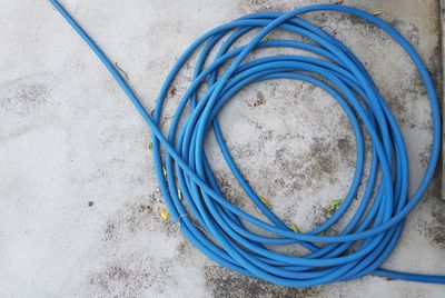 High angle view of blue pipe on floor