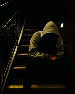 Man sitting in the dark