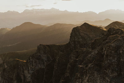 Scenic view of mountains against sky during sunset