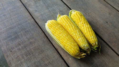 High angle view of yellow vegetables on table