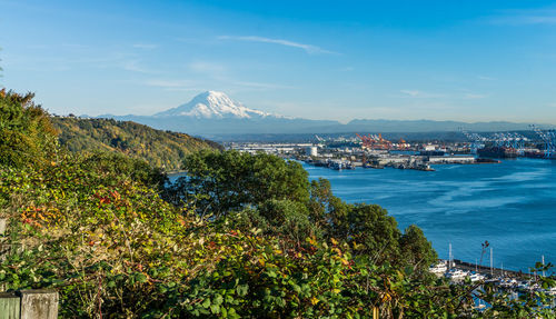 A view of mount rainier and the port of tacoma.