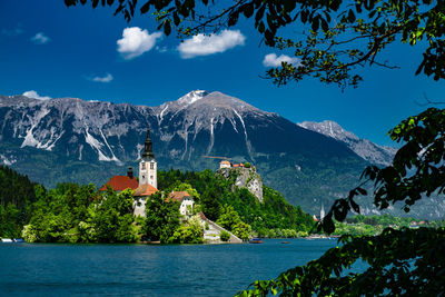 Lake bled and church against mountains