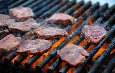 Close-up of meat on barbecue grill