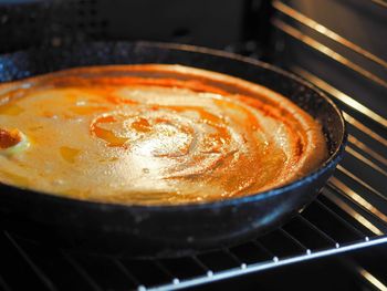 This autumn round homemade pumpkin pie is baked in an even pan in the home oven. healthy food.