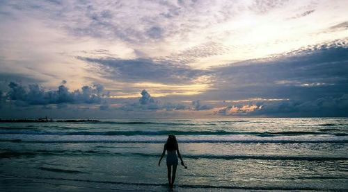 Scenic view of sea at sunset