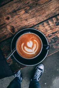 High angle view of cappuccino on table