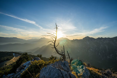 Scenic view of mountains against sky during sunset