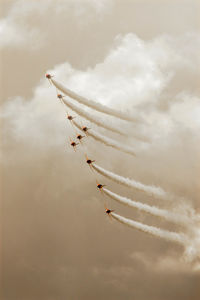 Low angle view of airplane flying in sky