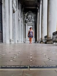 Full length of woman walking on walkway