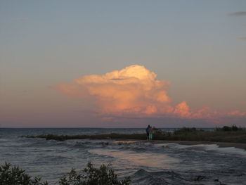 Scenic view of sea at sunset