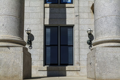 Column terrace and front doors in capitol. government building on a sunny day.