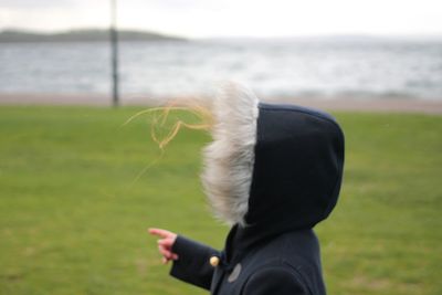 Side view of child on field