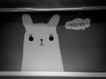 Close-up of sign on wall